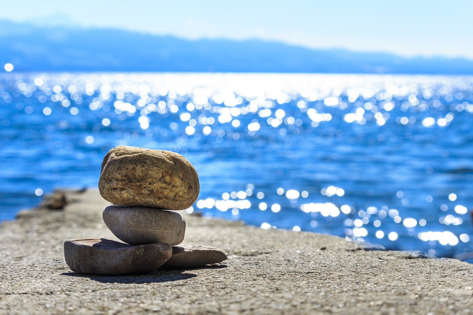 cairn with water backdrop